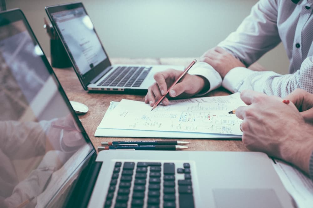 People reviewing financial documents together
